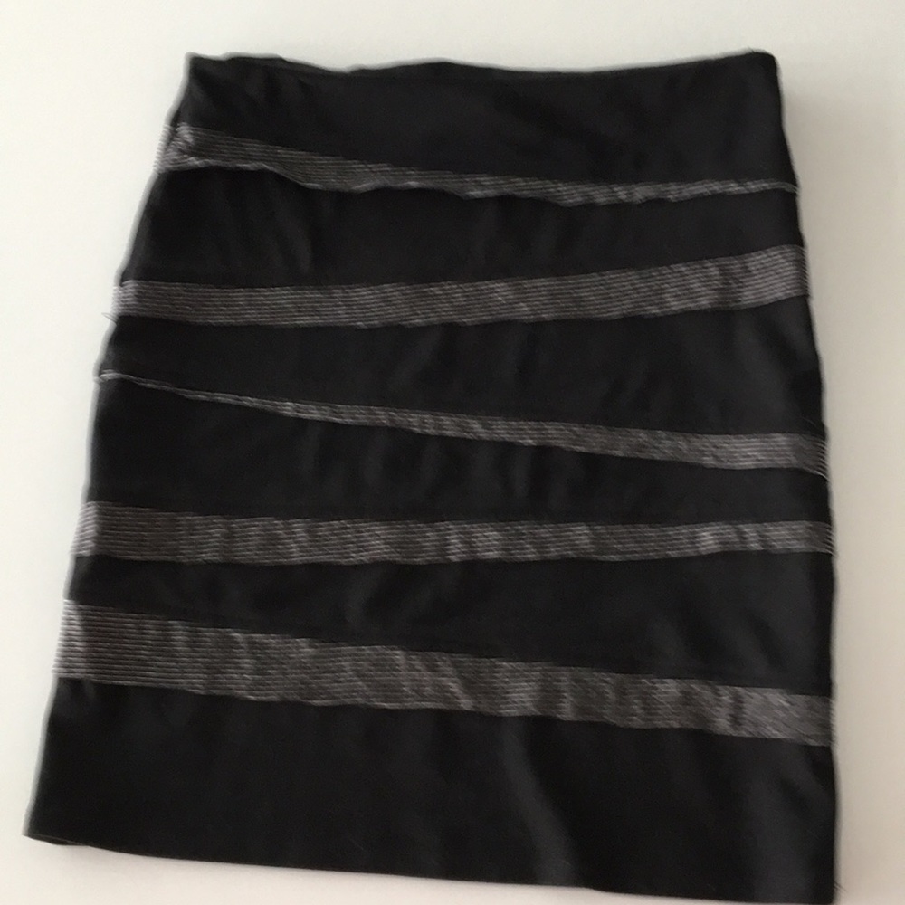 Body (not too)con black skirt
